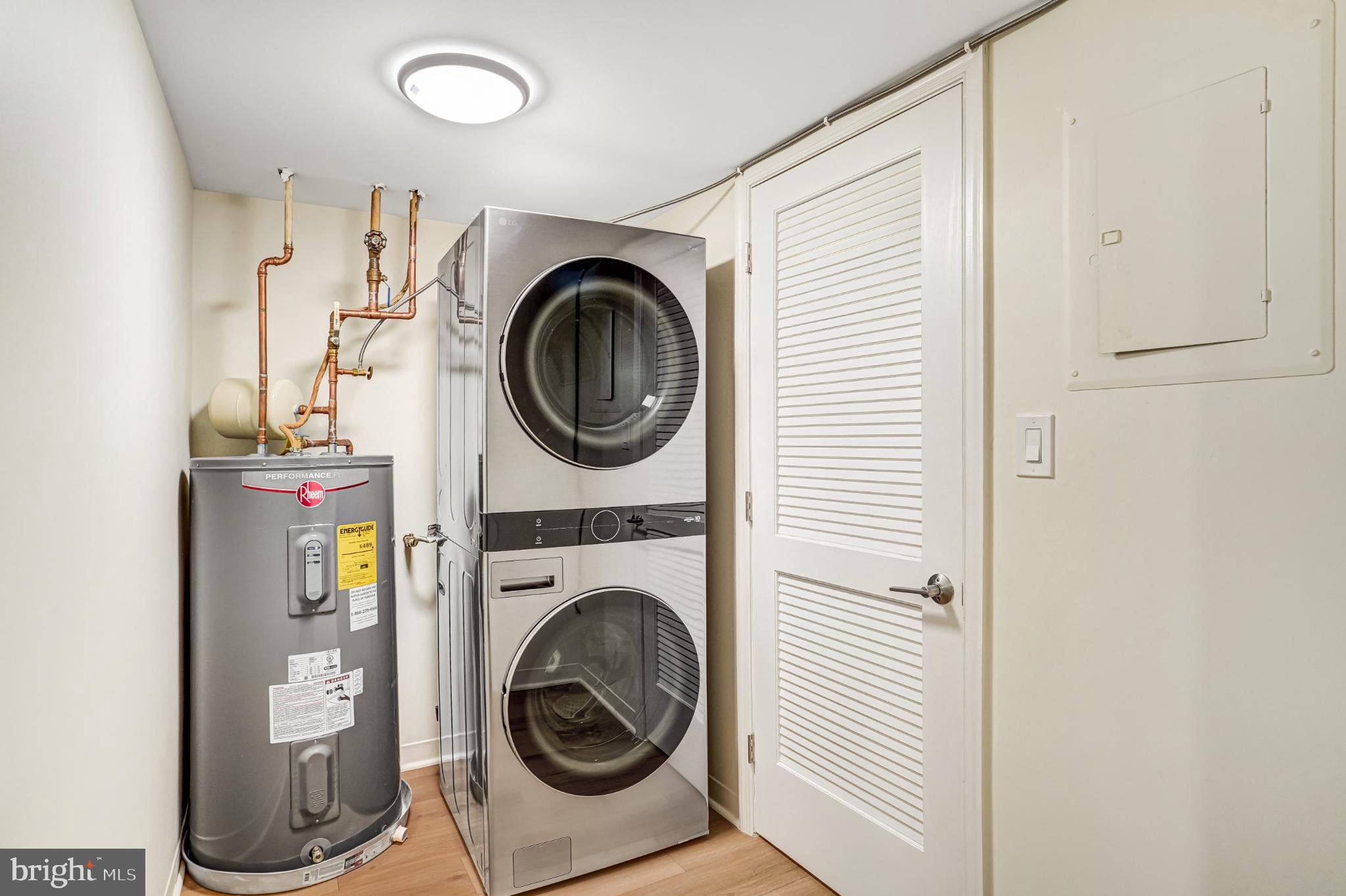 5825 Cove Landing Road, Unit 101 Burke, VA 22015 - Photo 15 of 30 Modern laundry space with new sleek appliances.