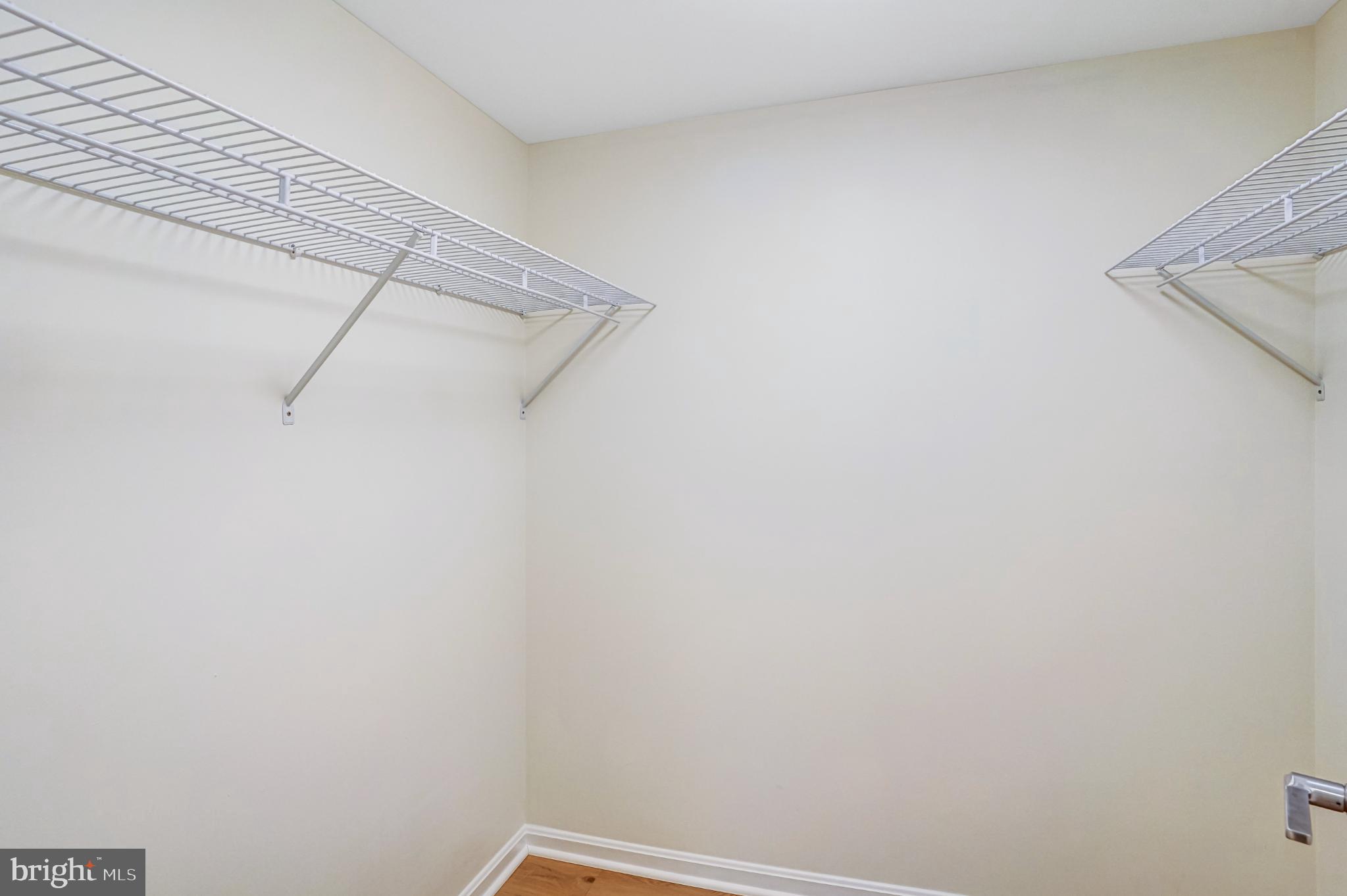 5825 Cove Landing Road, Unit 101 Burke, VA 22015 - Photo 22 of 30 Spacious walk-in closet awaits you.