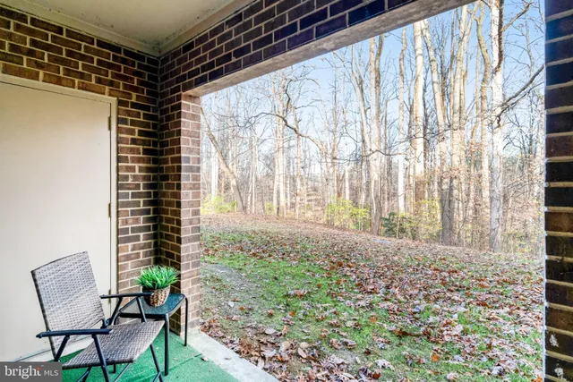 a view of a porch with a bench
