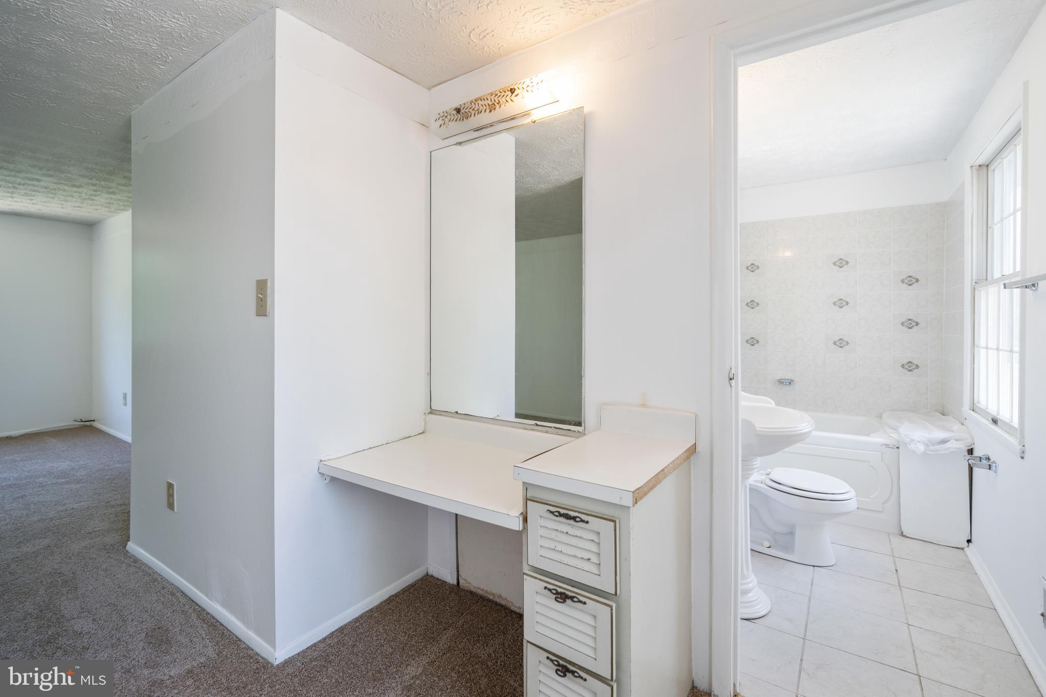 9120 Briarchip Street Laurel, MD 20708 - Photo 29 of 43 master bedroom and bathroom