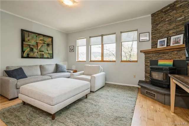 a bedroom with bed and a window