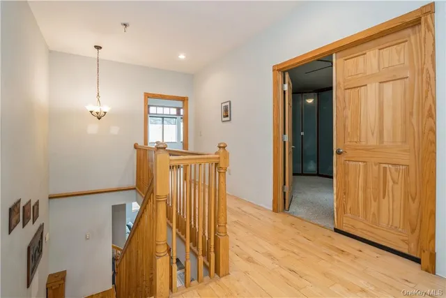 a view of entryway with wooden floor