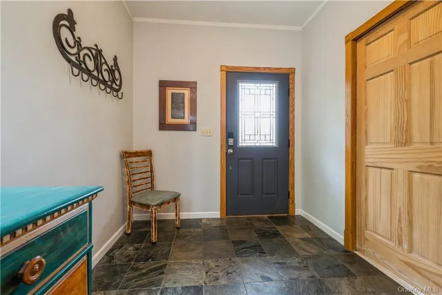 a view of room with furniture and windows