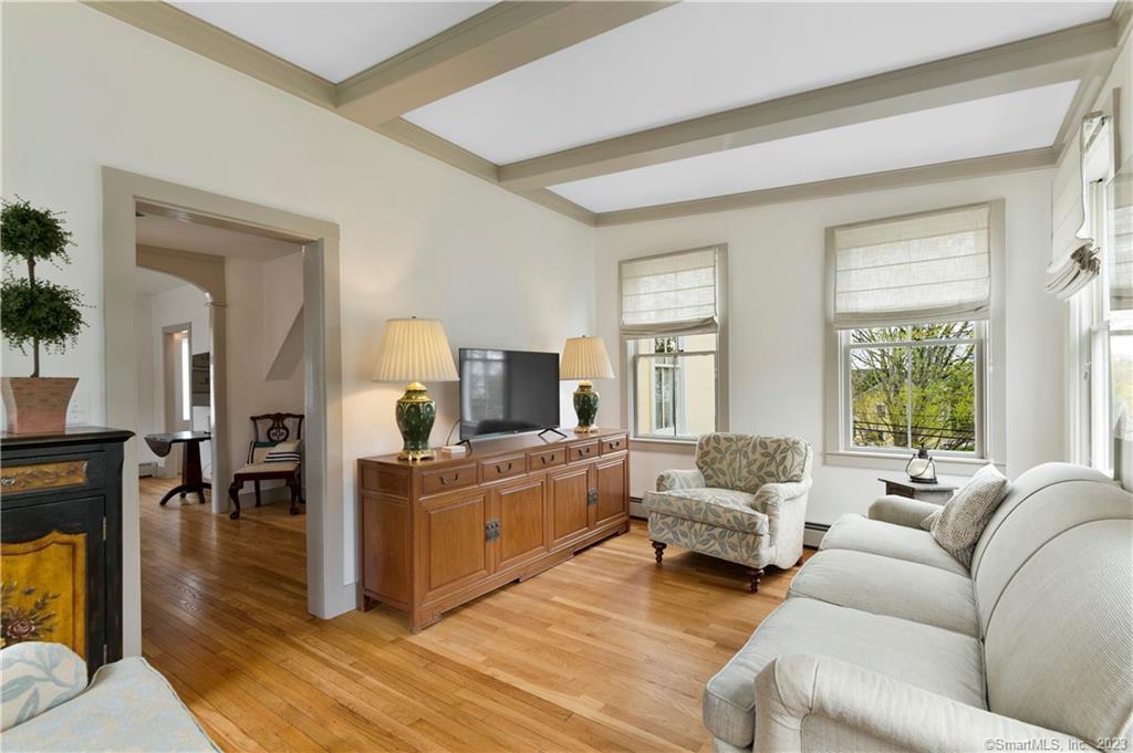 2 Ashby Street Mystic, CT 06355 - Photo 1 of 22 a living room with furniture and a fireplace