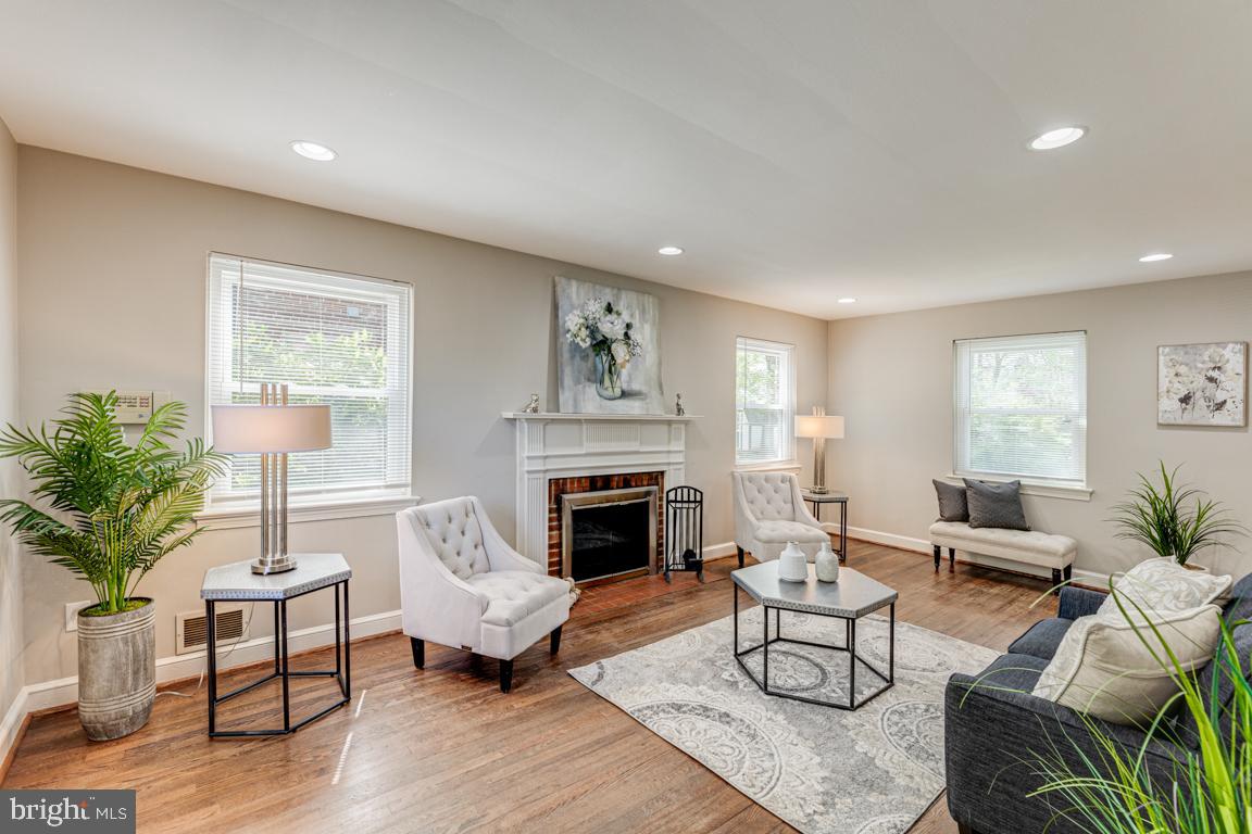 1016 Stirling Road Silver Spring, MD 20901 - Photo 5 of 26 Living space with wood burning fireplace