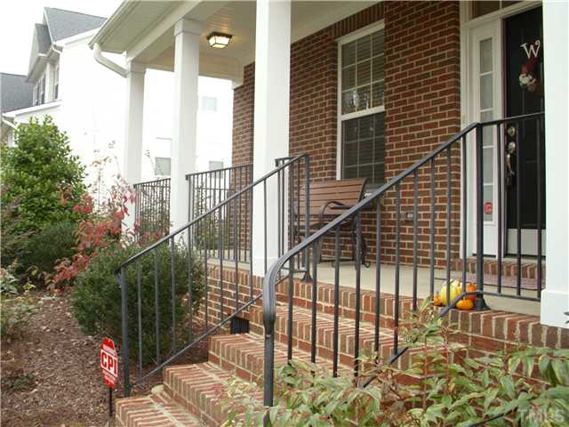 5802 St Agnes Way Raleigh, NC 27612 - Photo 22 of 25 Sit on your rocking chair front porch and enjoy a cold drink. Porch