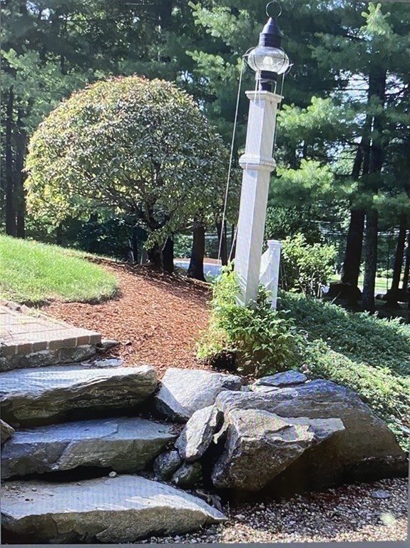 32 Freeman Road Chelmsford, MA 01824 - Photo 3 of 36 a view of a garden with sitting area