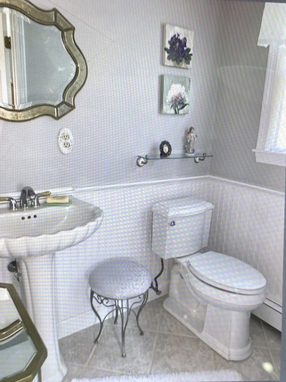 32 Freeman Road Chelmsford, MA 01824 - Photo 32 of 36 a bathroom with a toilet sink and mirror