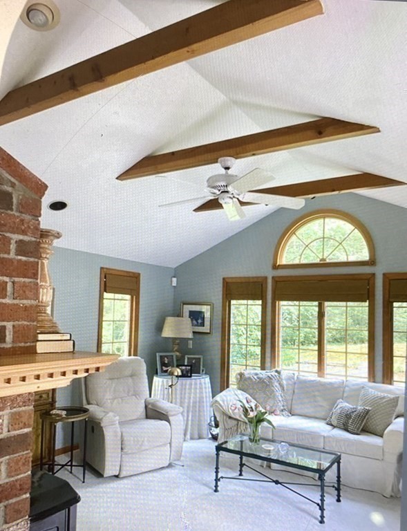32 Freeman Road Chelmsford, MA 01824 - Photo 8 of 36 a living room with furniture and a large window