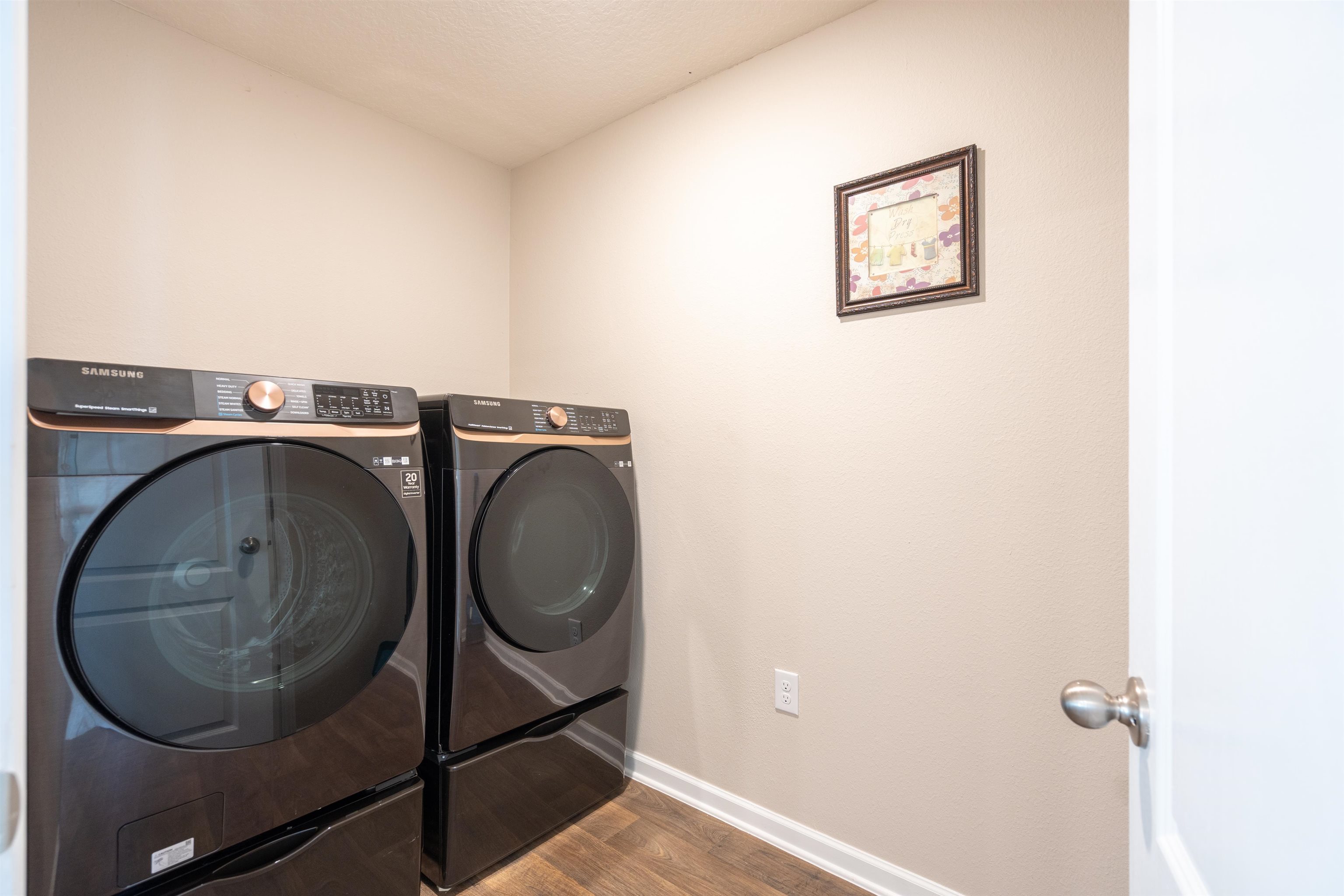 408 Falcon Ridge Road St. Augustine, FL 32084 - Photo 24 of 26 a utility room with dryer and washer