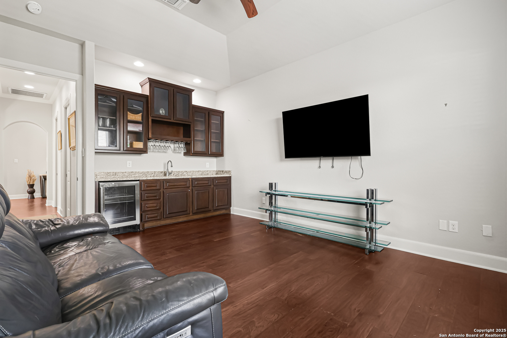 919 Sutters Rim San Antonio, TX 78258 - Photo 17 of 27 a living room with furniture and a flat screen tv