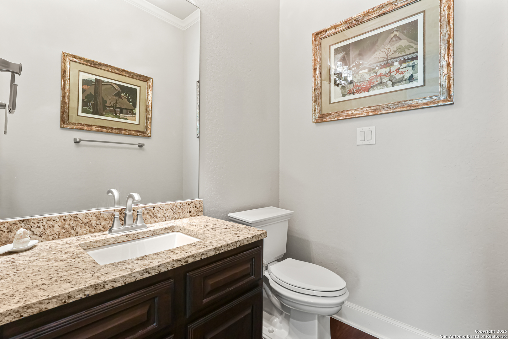 919 Sutters Rim San Antonio, TX 78258 - Photo 19 of 27 a bathroom with a granite countertop toilet and a sink