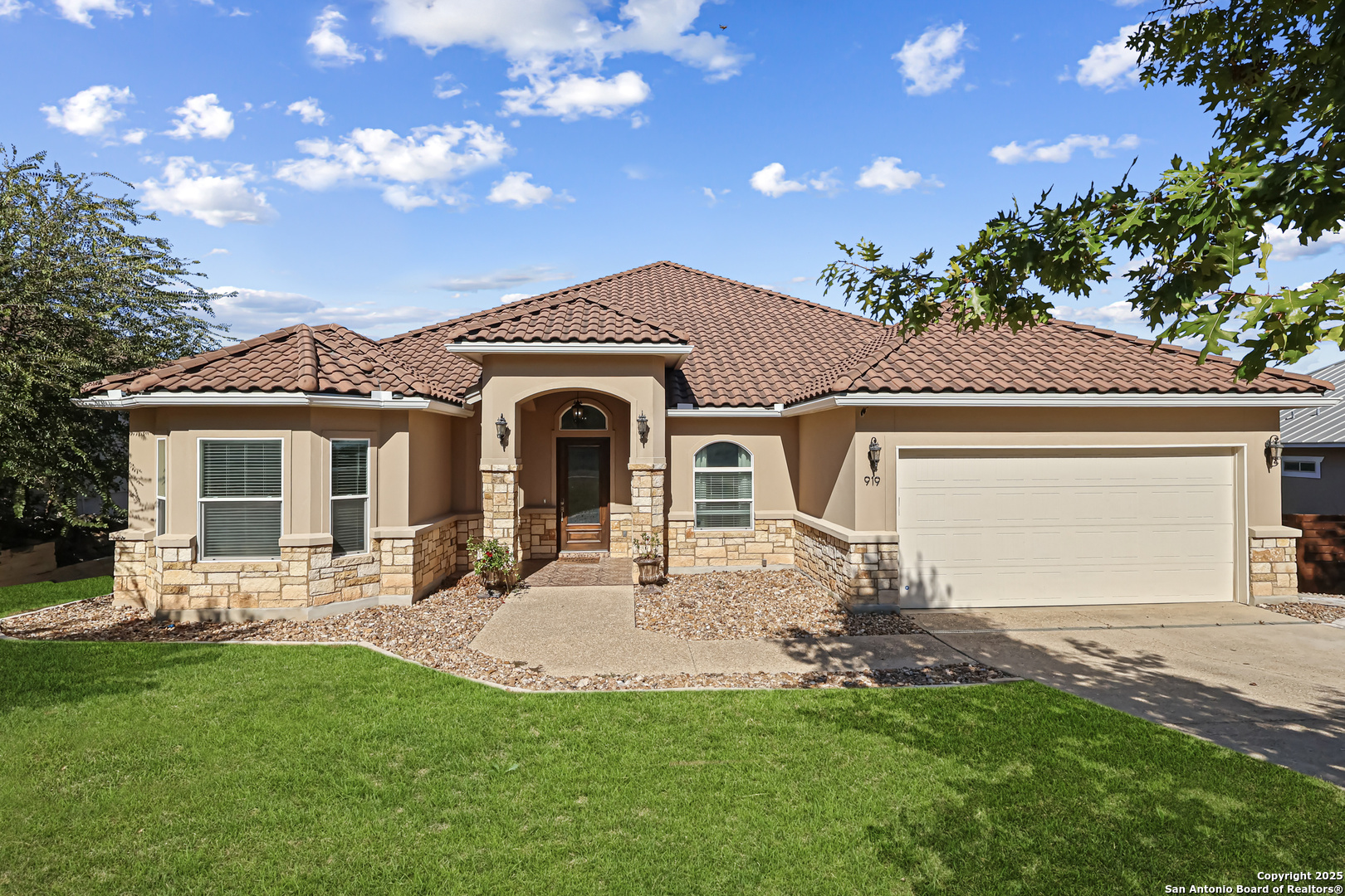 919 Sutters Rim San Antonio, TX 78258 - Photo 25 of 27 a view of a house with a yard porch and sitting area
