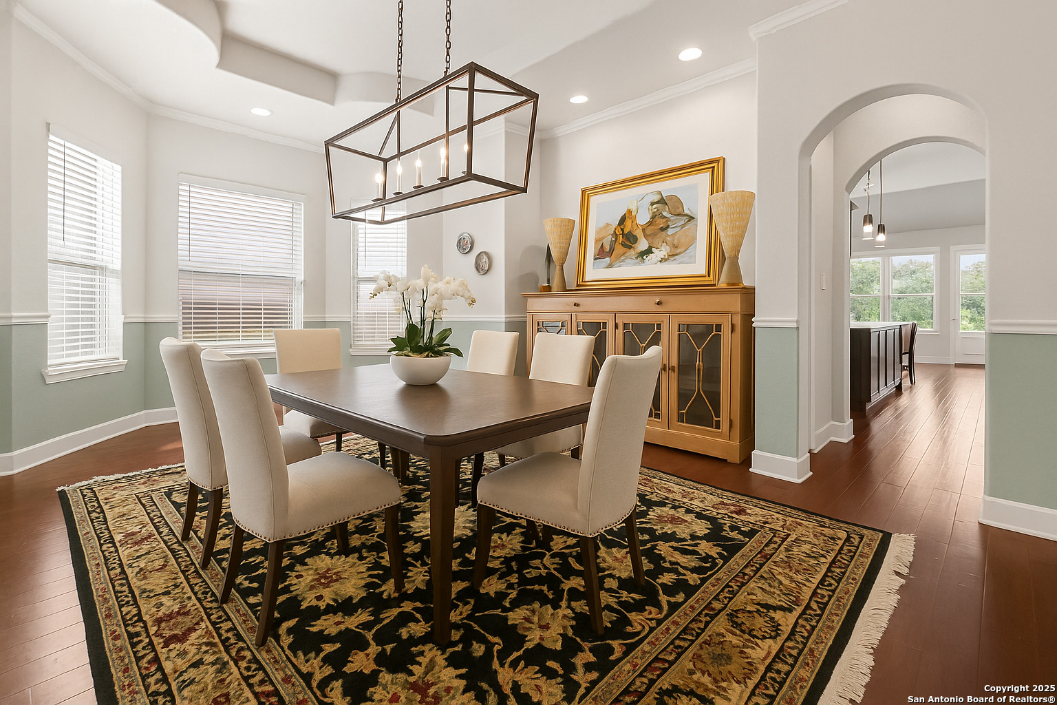 919 Sutters Rim San Antonio, TX 78258 - Photo 3 of 27 a view of a dining room with furniture window and wooden floor