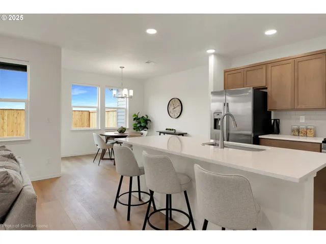 a bathroom with a sink vanity and a mirror