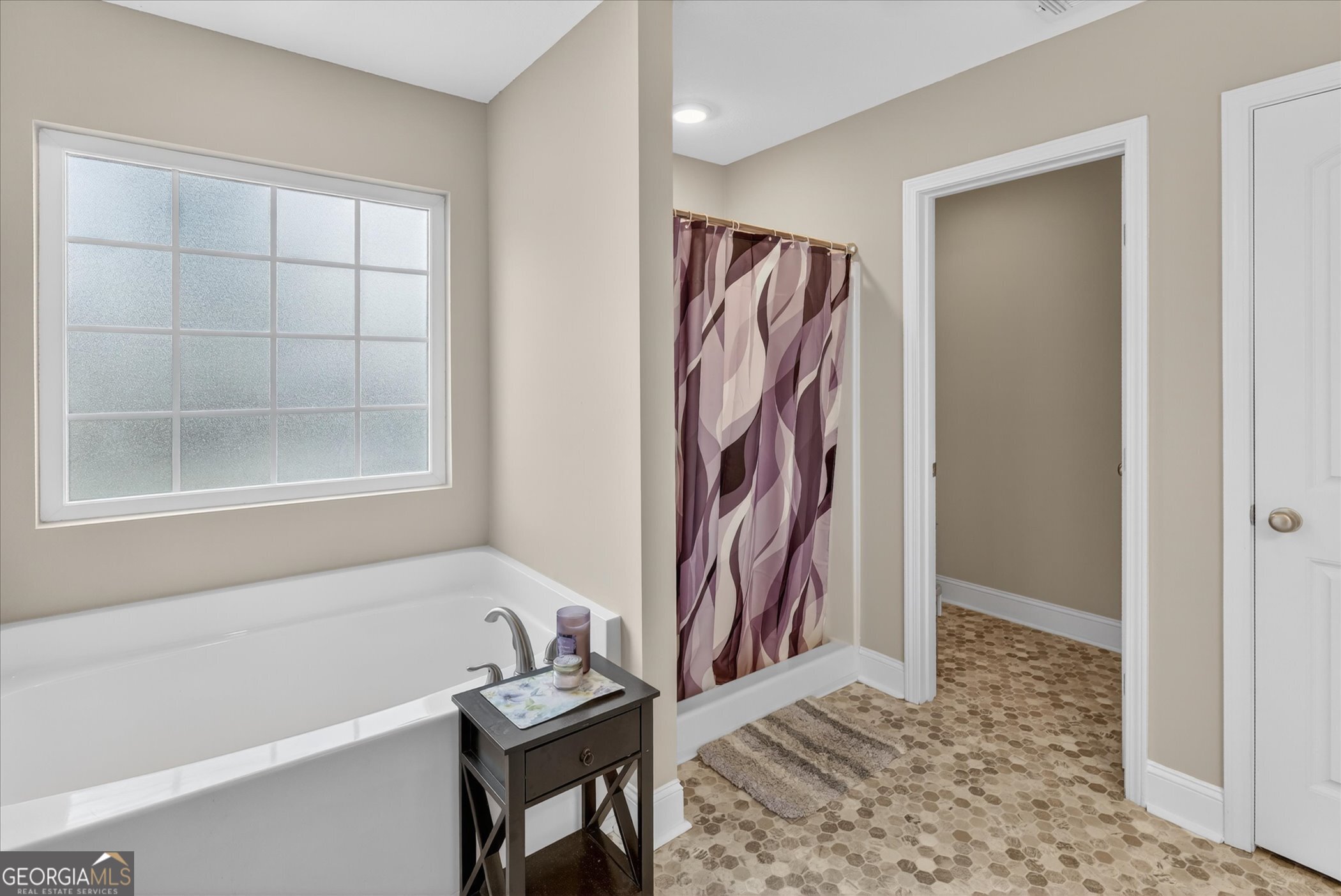 164 Stonebrook Way Statesboro, GA 30458 - Photo 23 of 46 a view of an empty room with window and hardwood