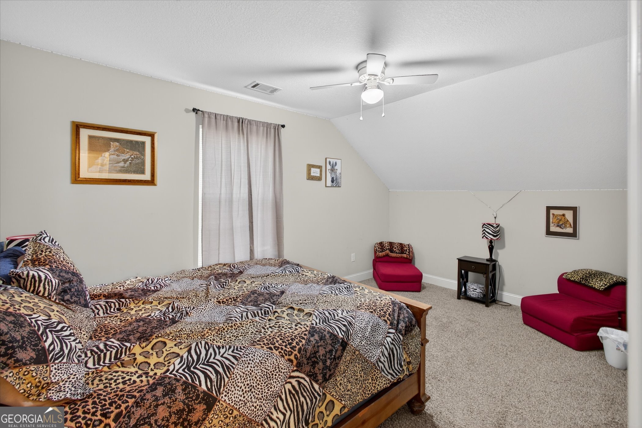 164 Stonebrook Way Statesboro, GA 30458 - Photo 27 of 46 a bedroom with a bed and lamp