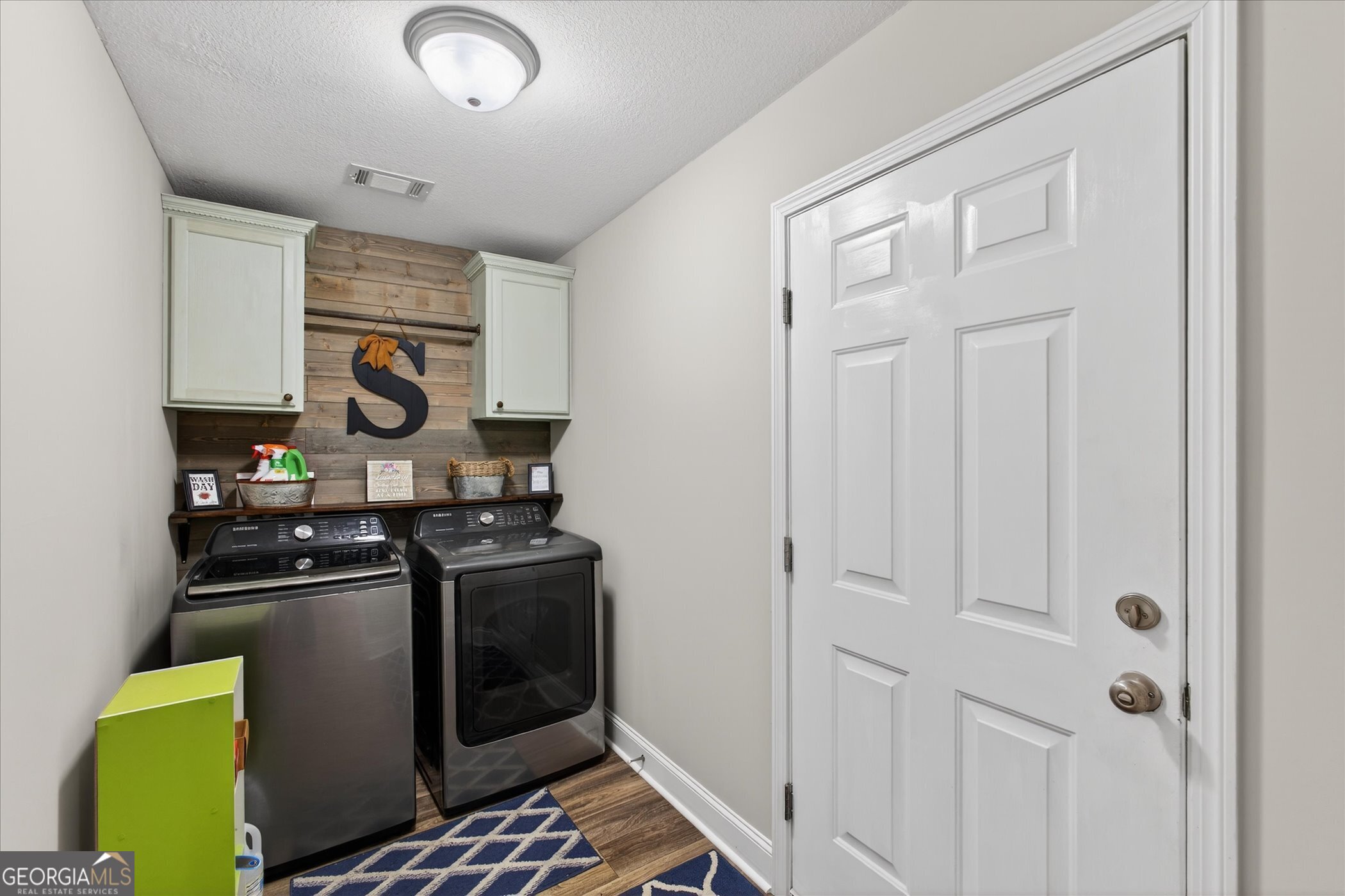 164 Stonebrook Way Statesboro, GA 30458 - Photo 34 of 46 a kitchen with a stove and a refrigerator