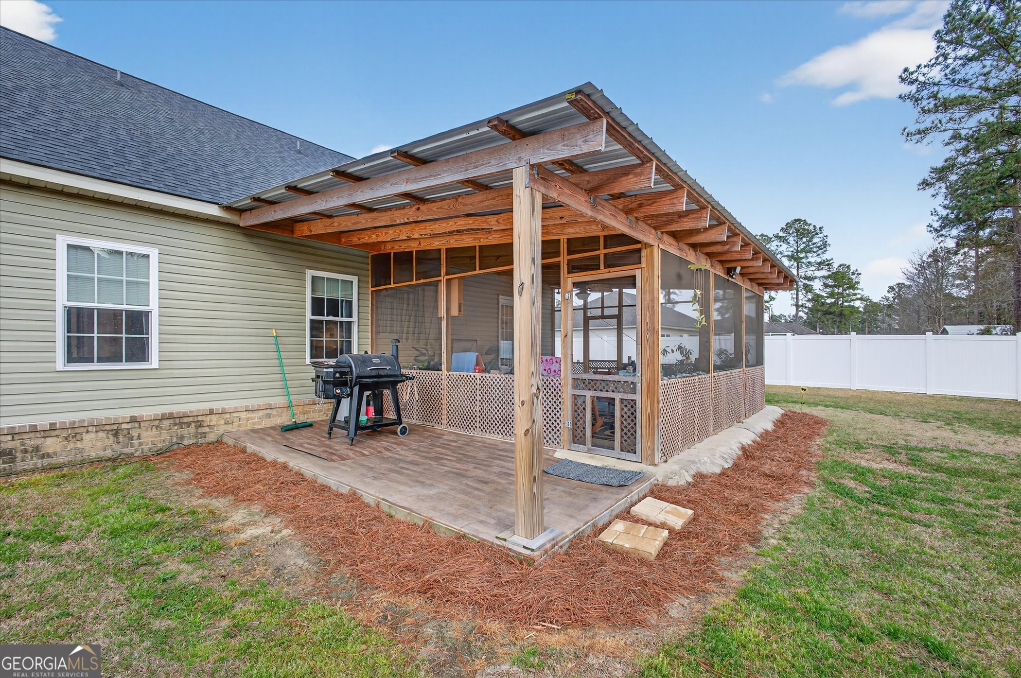 164 Stonebrook Way Statesboro, GA 30458 - Photo 35 of 46 a view of house with backyard and sitting area