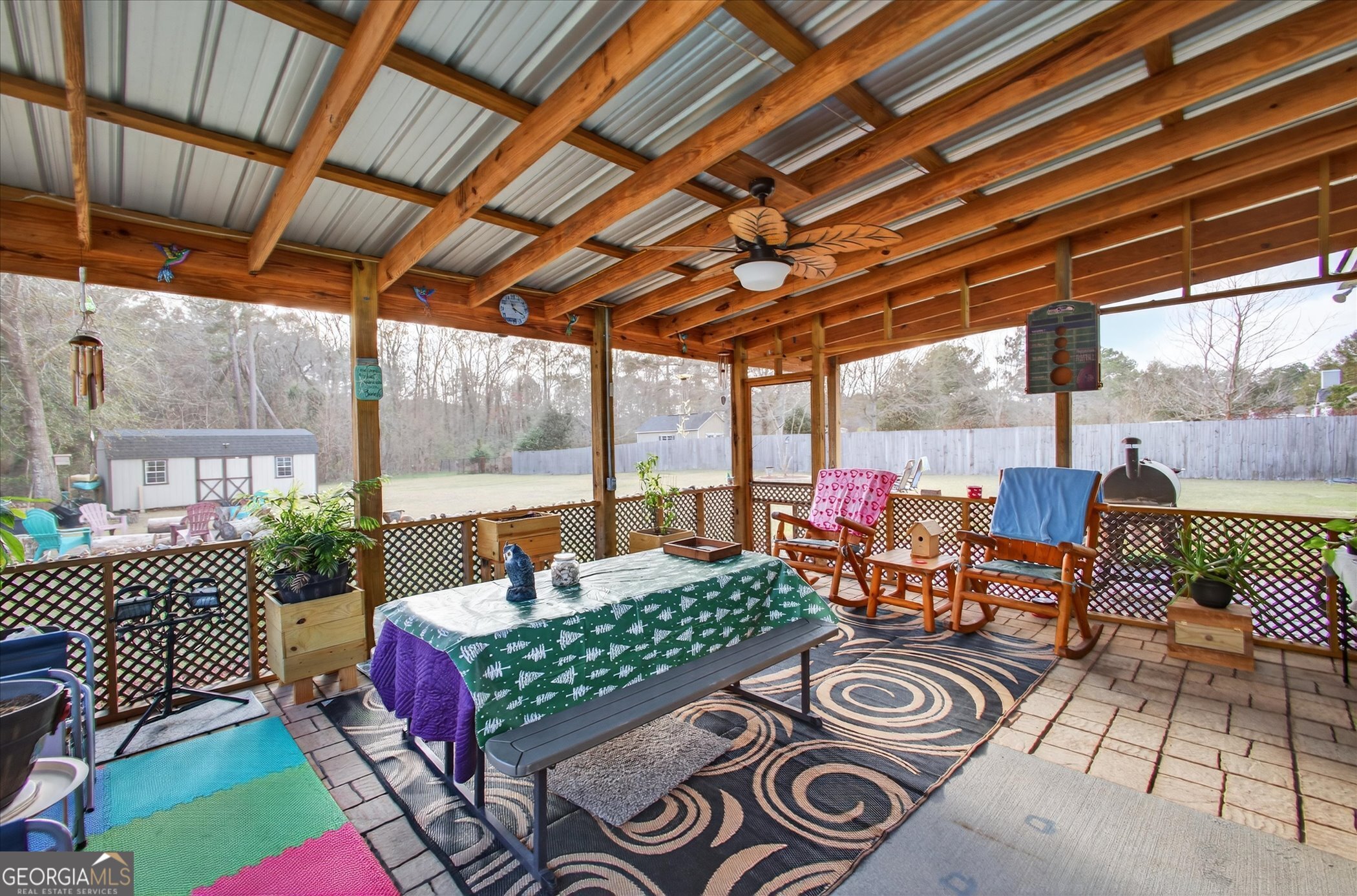 164 Stonebrook Way Statesboro, GA 30458 - Photo 36 of 46 a outdoor living space with furniture and garden view