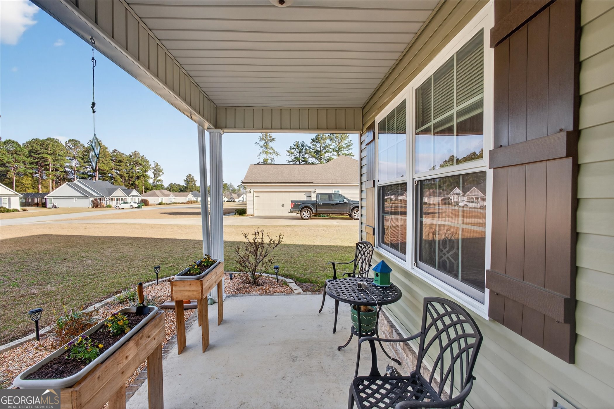 164 Stonebrook Way Statesboro, GA 30458 - Photo 38 of 46 a balcony with table and chairs