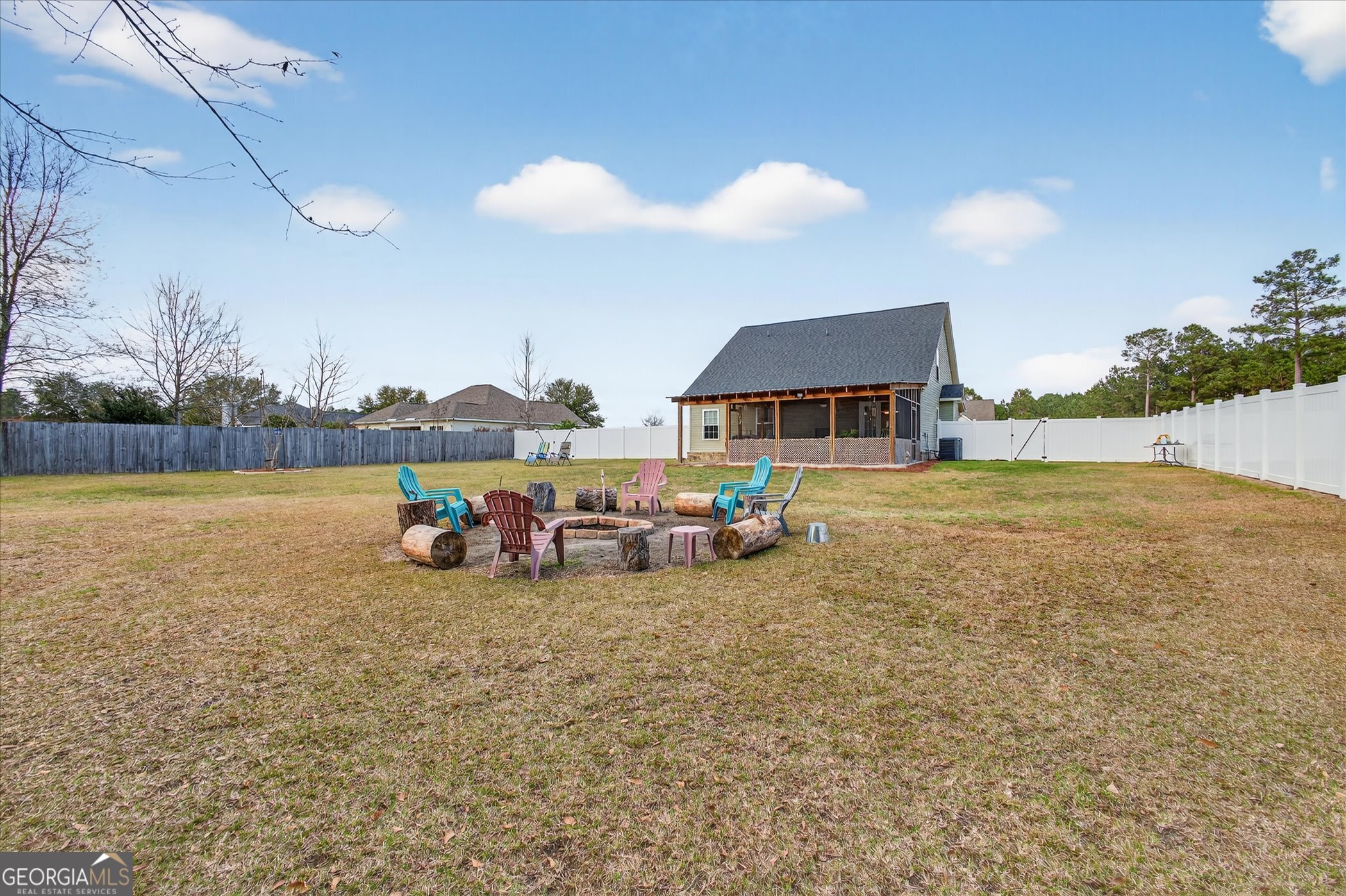 164 Stonebrook Way Statesboro, GA 30458 - Photo 39 of 46 a view of a swimming pool and lounge chairs