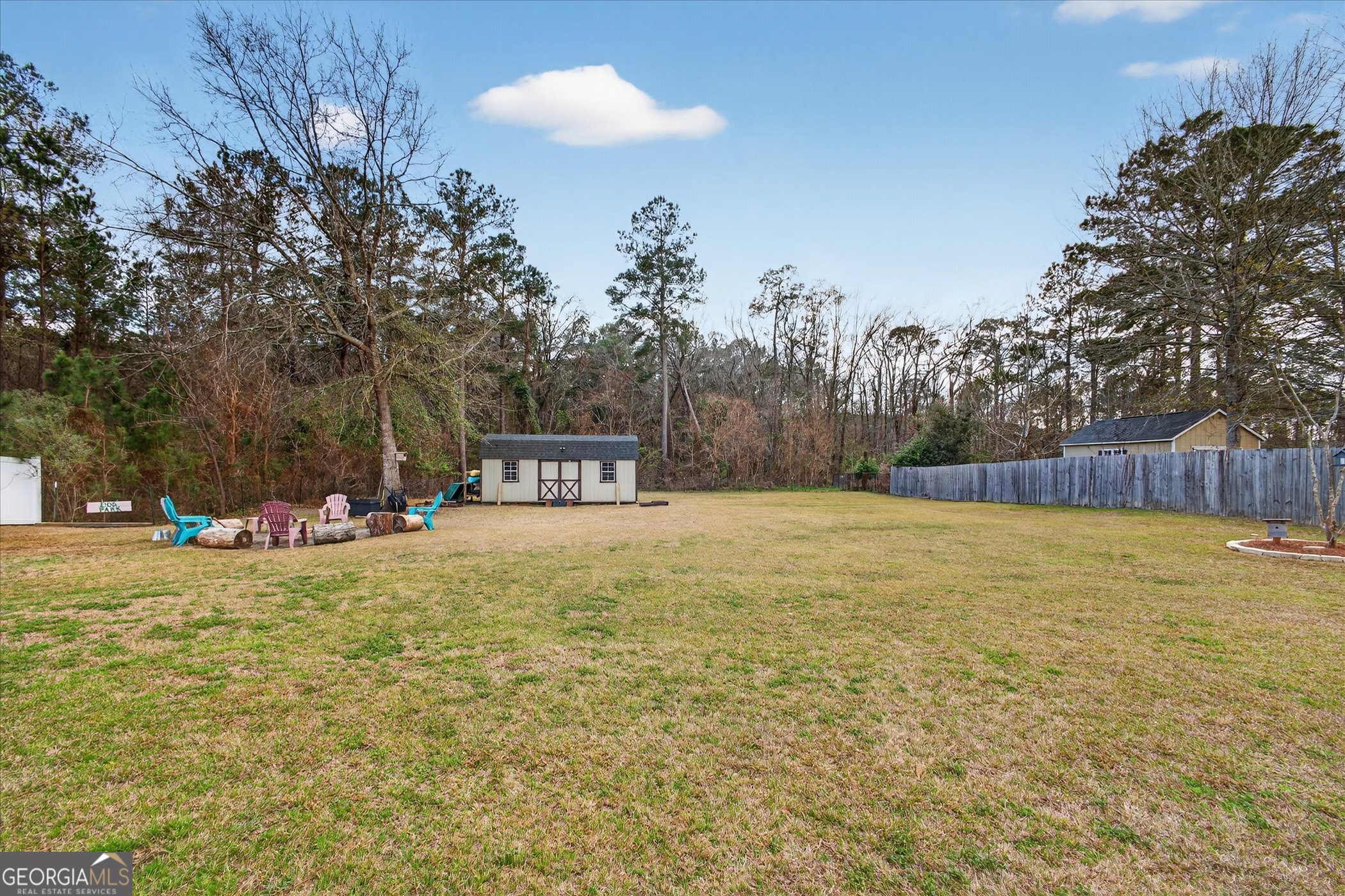 164 Stonebrook Way Statesboro, GA 30458 - Photo 43 of 46 a swimming pool with wooden fence