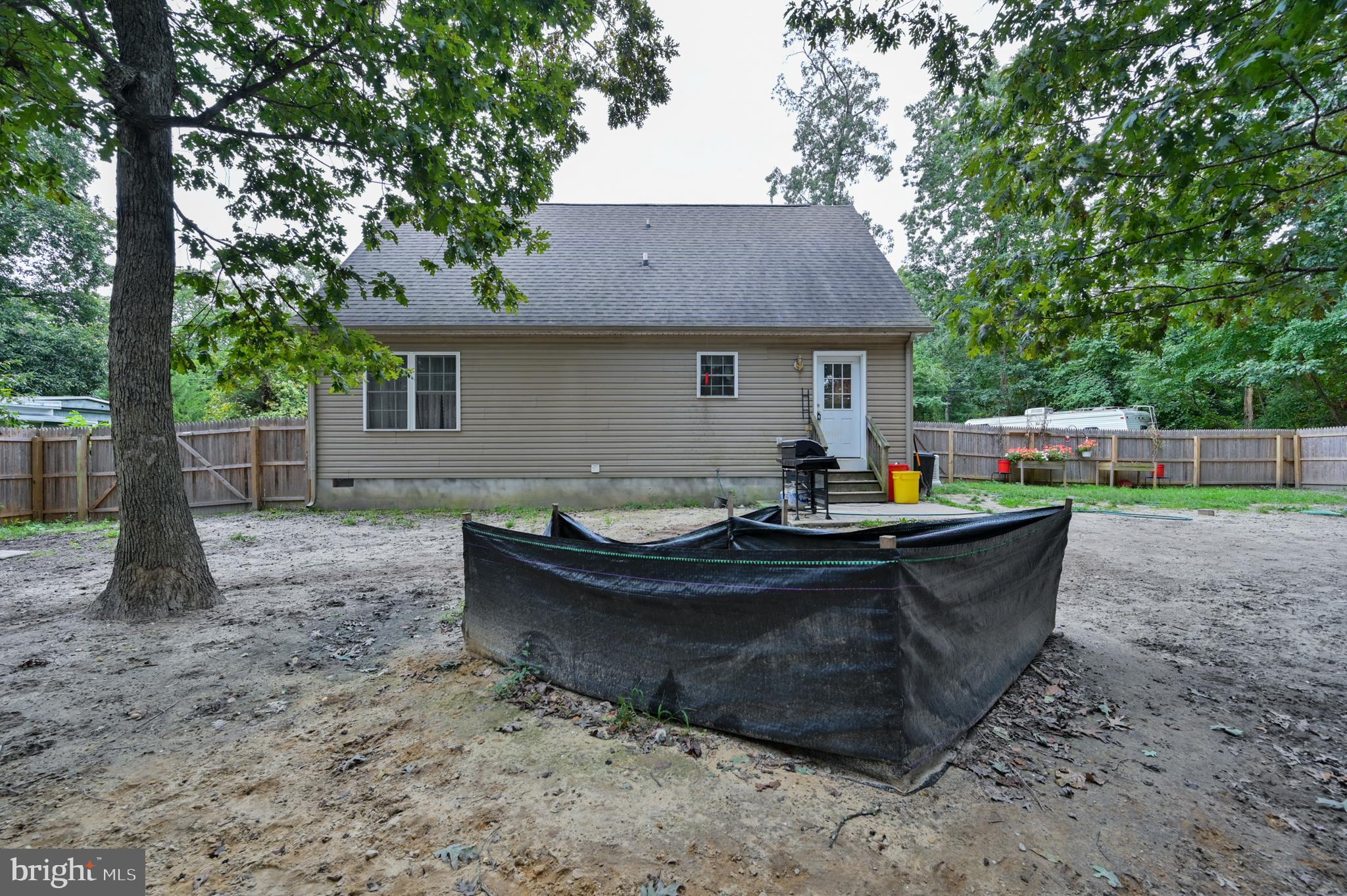 421 Evergreen Road Millville, NJ 08332 - Photo 20 of 26 a view of house with backyard and outdoor seating