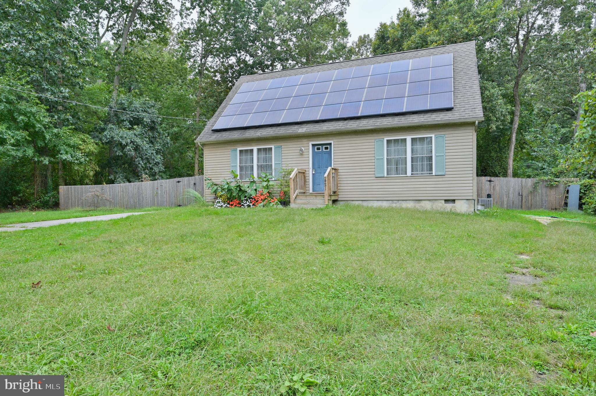421 Evergreen Road Millville, NJ 08332 - Photo 21 of 26 a view of a house with a yard and sitting area