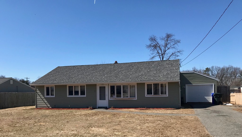40 Old Farm Road Springfield, MA 01119 - Photo 1 of 16 a front view of a house with a yard