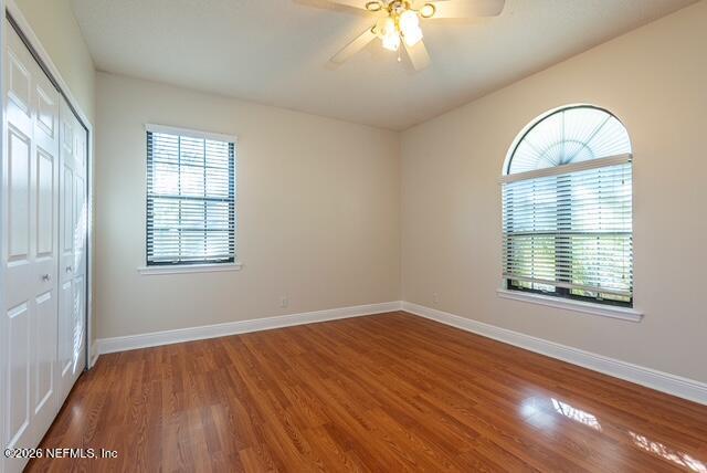 1467 Tama-Ran Place Fruit Cove, FL 32259 - Photo 15 of 22 an empty room with wooden floor chandelier and windows