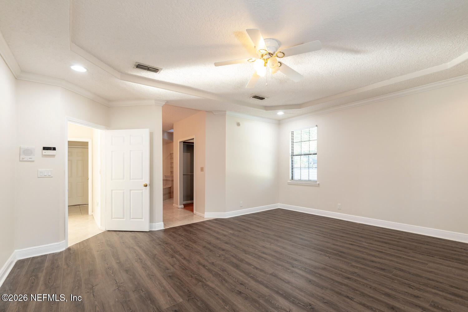1467 Tama-Ran Place Fruit Cove, FL 32259 - Photo 9 of 22 a view of an empty room with wooden floor
