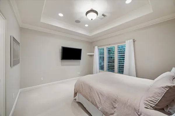 a bathroom with a granite countertop sink a toilet and a bathtub