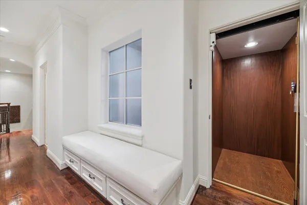 a bathroom with a sink mirror and vanity