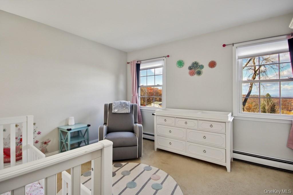 7 Farview Road Hopewell Junction, NY 12533 - Photo 22 of 32 a bedroom with furniture and a window