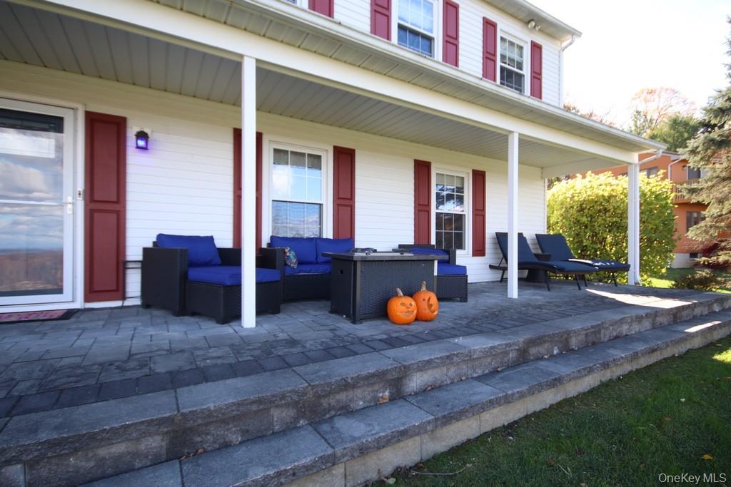 7 Farview Road Hopewell Junction, NY 12533 - Photo 3 of 32 a view of a house with backyard and porch