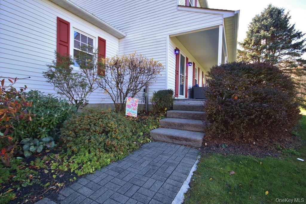 7 Farview Road Hopewell Junction, NY 12533 - Photo 4 of 32 a front view of a house with garden