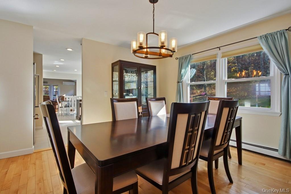 7 Farview Road Hopewell Junction, NY 12533 - Photo 8 of 32 a view of a dining room with furniture window and wooden floor