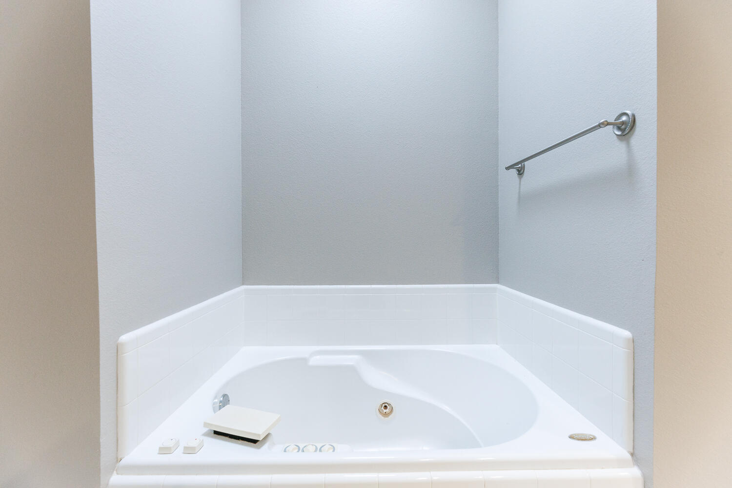 5504 101st Street Lubbock, TX 79424 - Photo 29 of 50 a close up of a bathtub in a bathroom
