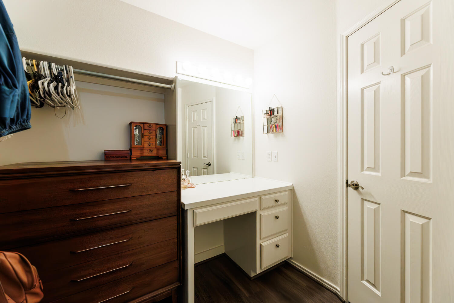 5504 101st Street Lubbock, TX 79424 - Photo 32 of 50 a room with a chair and a dresser