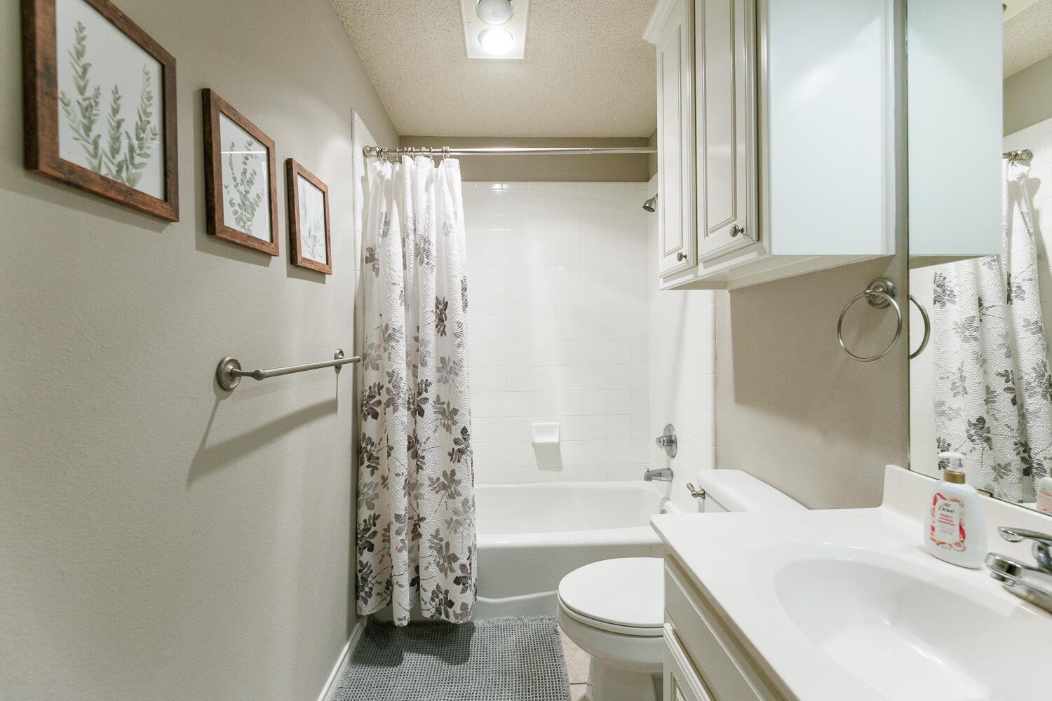 5504 101st Street Lubbock, TX 79424 - Photo 37 of 50 a bathroom with a sink toilet and shower