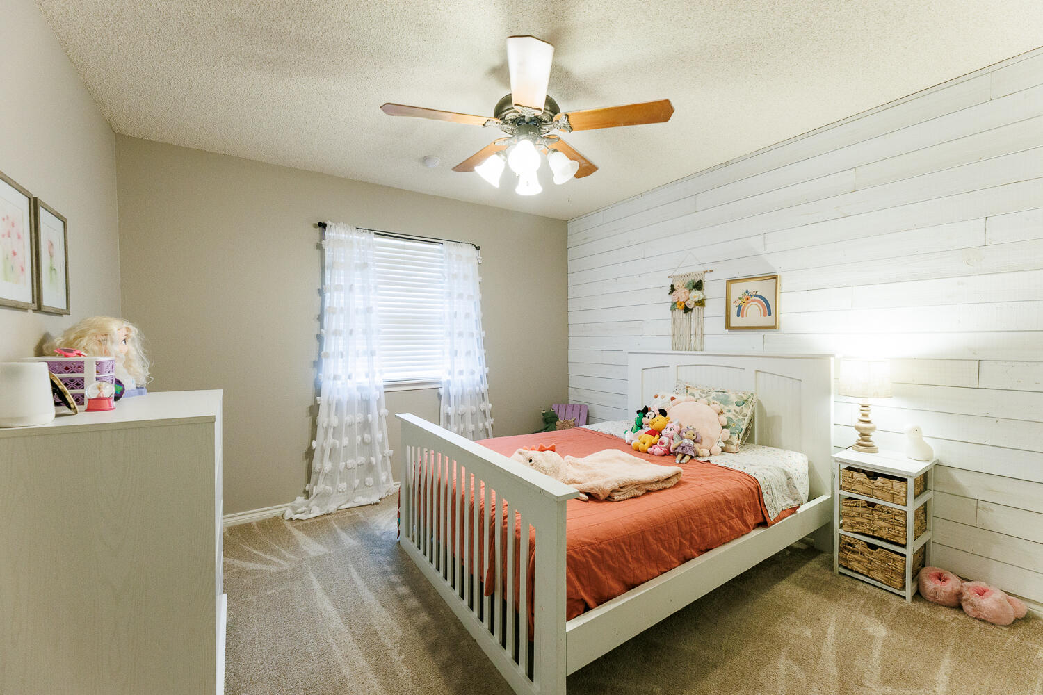 5504 101st Street Lubbock, TX 79424 - Photo 40 of 50 a bedroom with a bed and a chandelier