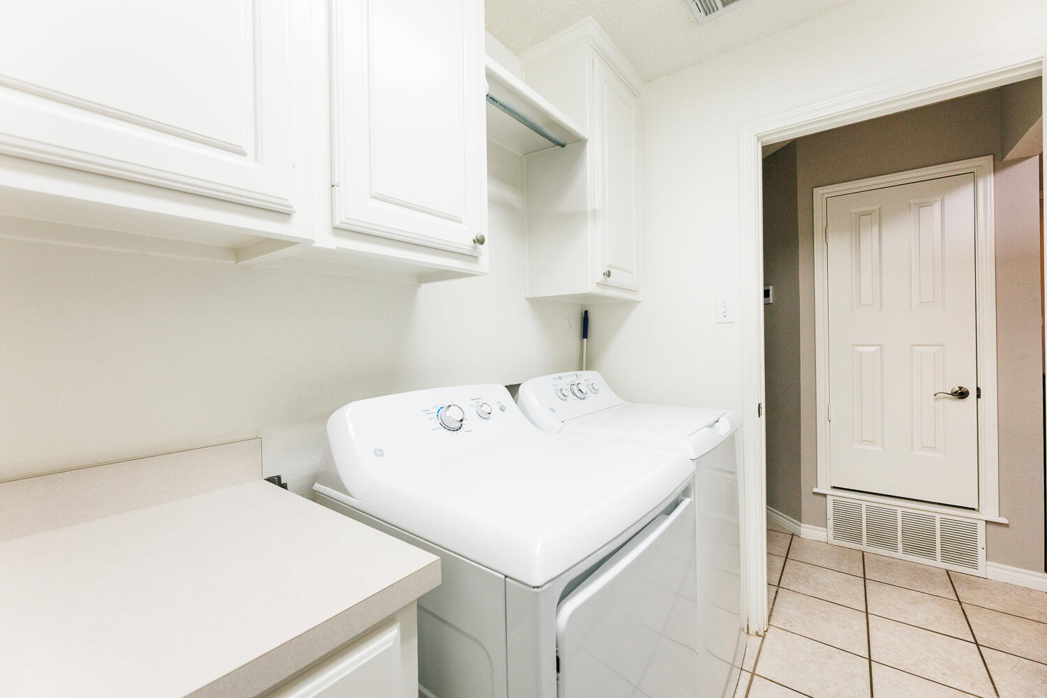 5504 101st Street Lubbock, TX 79424 - Photo 43 of 50 a utility room with dryer and washer