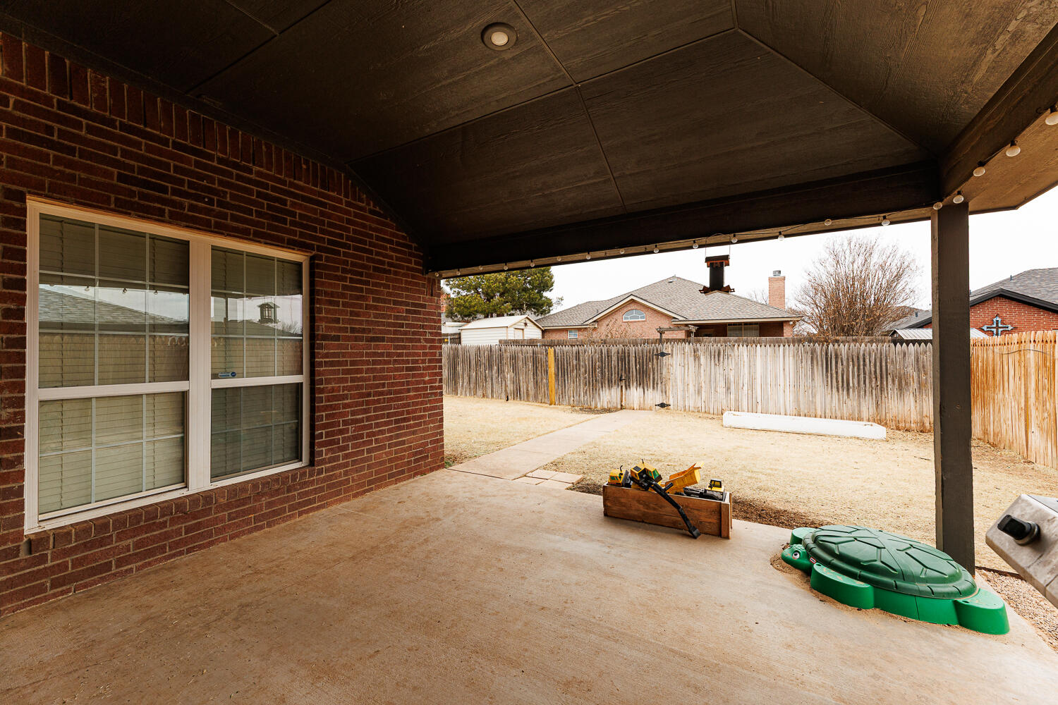 5504 101st Street Lubbock, TX 79424 - Photo 44 of 50 a view of a room with gym equipment and a large window