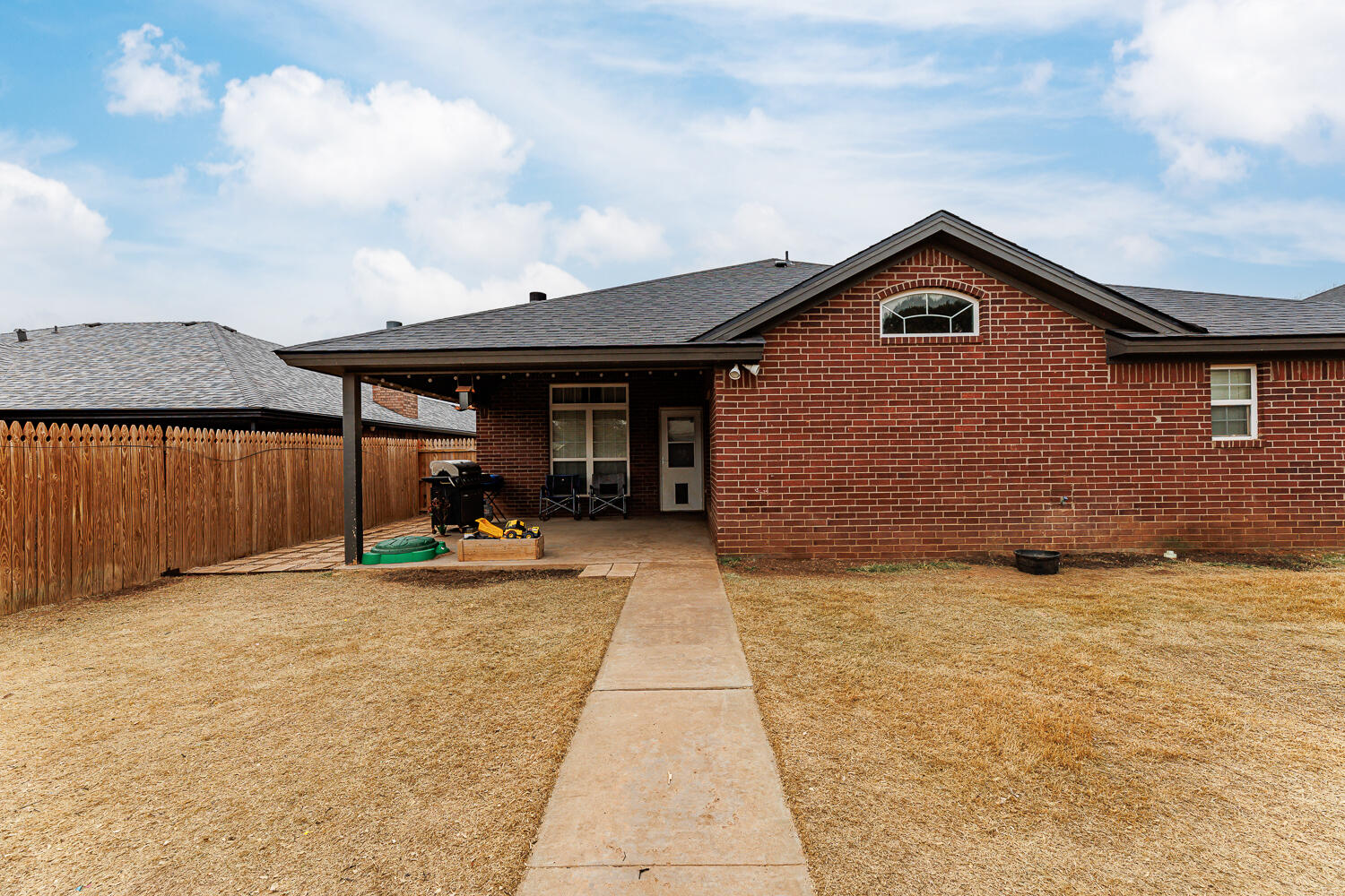 5504 101st Street Lubbock, TX 79424 - Photo 47 of 50 a view of a house with backyard and sitting area