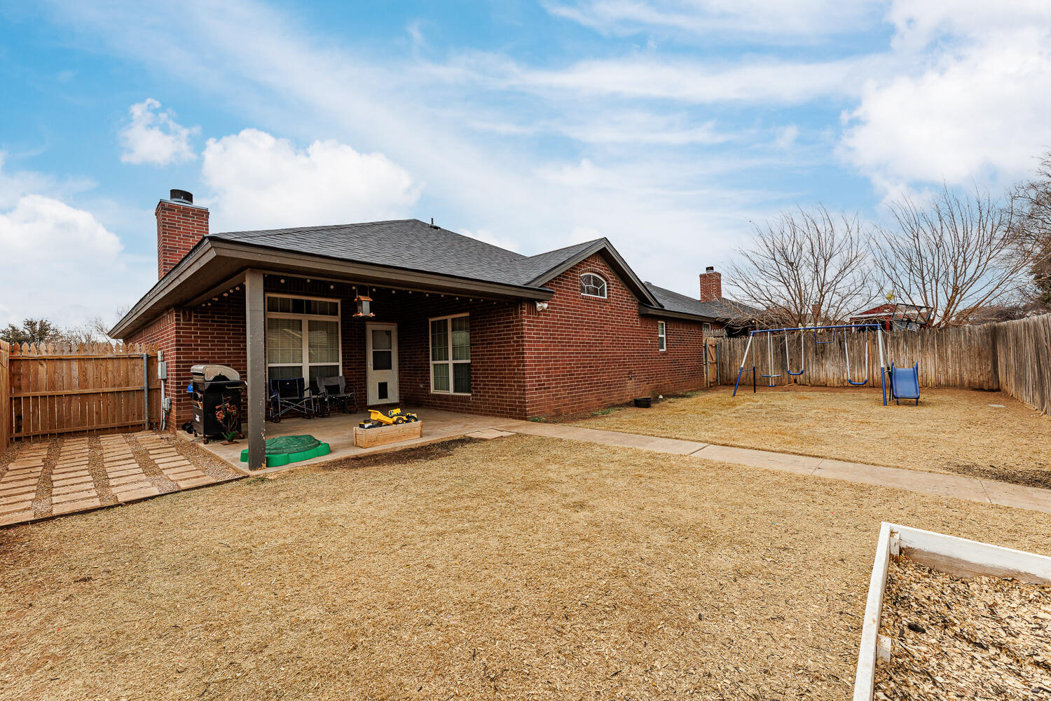 5504 101st Street Lubbock, TX 79424 - Photo 48 of 50 a view of a house with basketball court