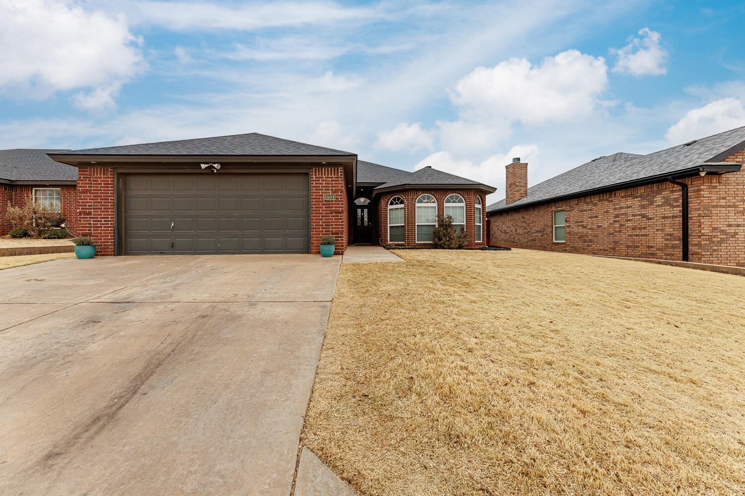5504 101st Street Lubbock, TX 79424 - Photo 49 of 50 a view of a house with a garage