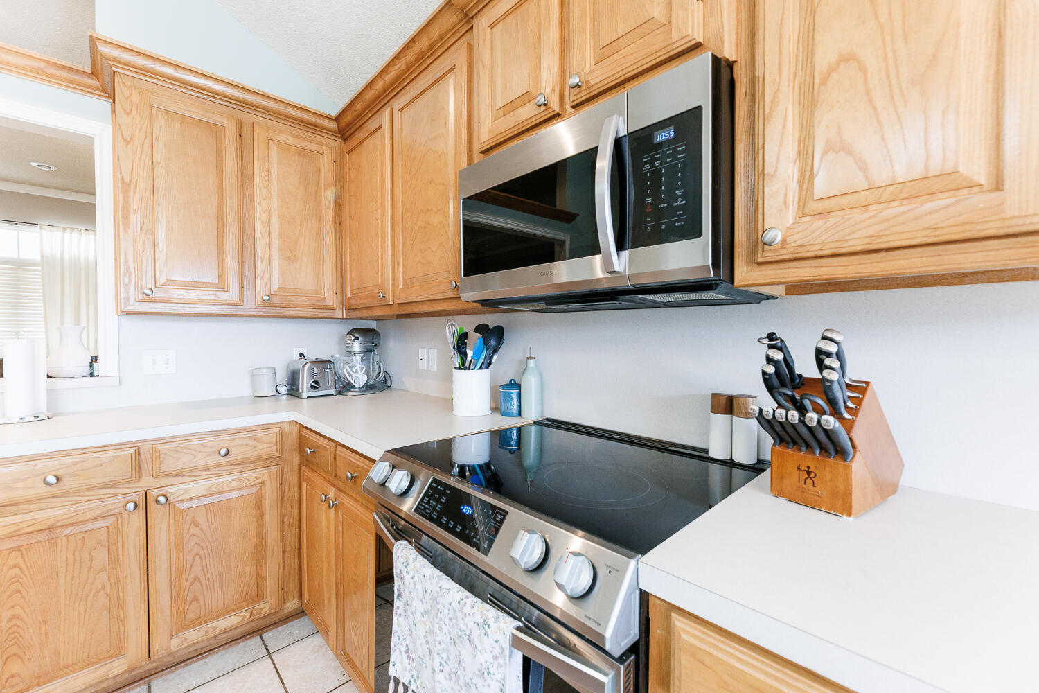 5504 101st Street Lubbock, TX 79424 - Photo 9 of 50 a kitchen with a sink and cabinets