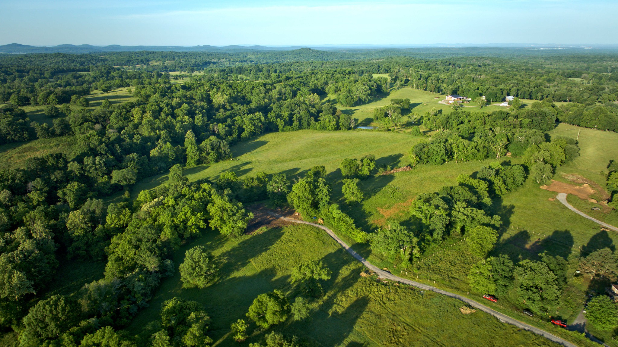 0 Burnt House Road Lebanon, TN 37090 - Photo 4 of 12 an aerial view of residential houses with outdoor space and trees