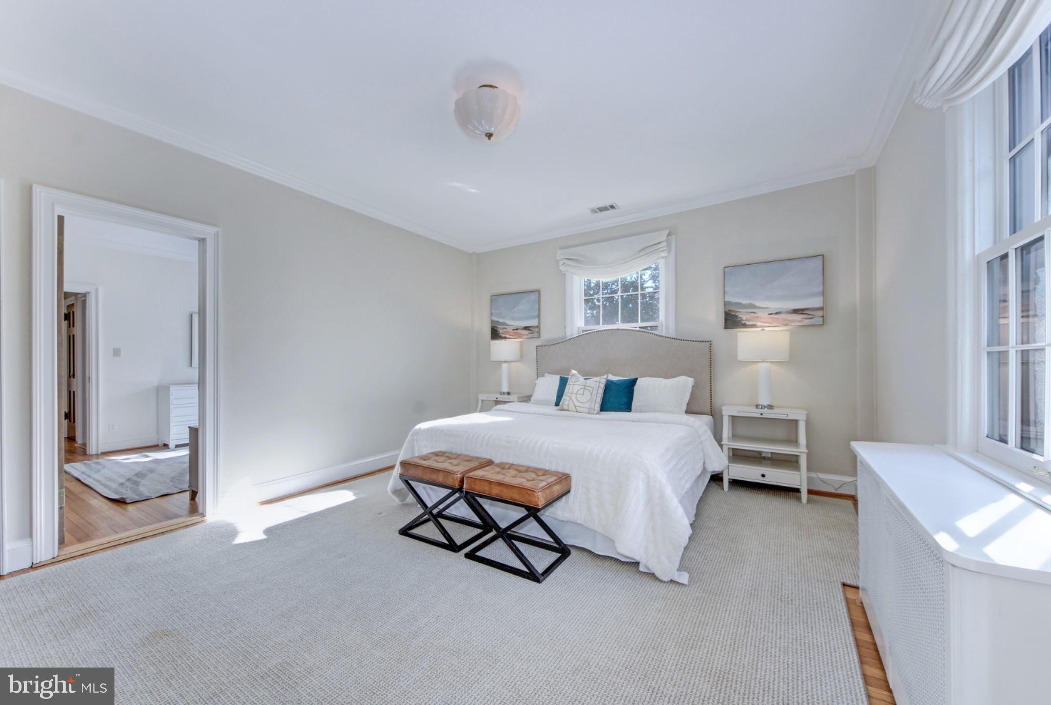 3000 Tilden Street Northwest, Unit 501I Washington, DC 20008 - Photo 16 of 48 a bedroom with a bed and a cabinets